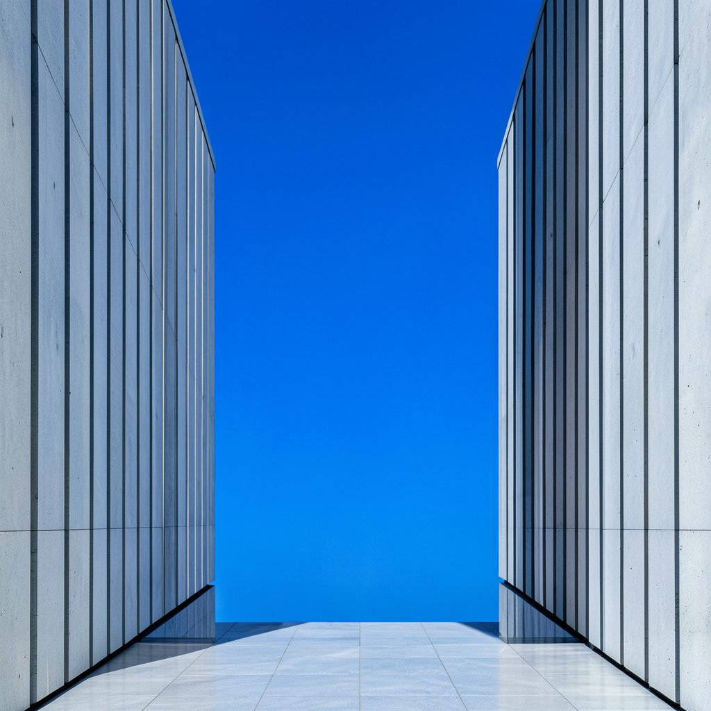 Clean architectural photograph of a modern convention centre facade with strong horizontal symmetry, soft natural light, pale stone and glass, and a calm indigo-to-cream sky above.